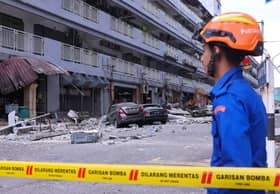 Doctor cheats death as roof of four-storey building collapses
