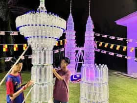Two brothers build national landmarks models with used beverage bottles