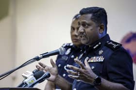 Seven face charges for wearing military-style ceremonial attire