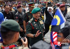 Agong hails unity govt for well-organised National Day event