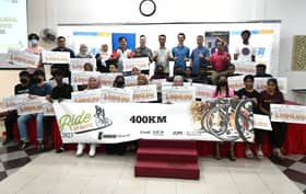 MBI, two other firms donate RM100,000 to orphans