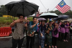 Pesta Lambaian to welcome, see off King, Queen remains lively despite heavy rain