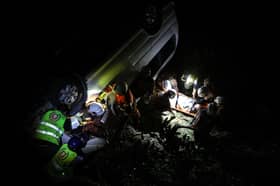 Singaporean tourist killed, 10 others injured as van plunges into ravine in Penang