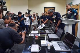 Cops nab 40 over cryptocurrency scam involving RM50 mln losses