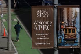 Trans-Pacific trade deal members meet at APEC summit, say open to new members