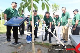 PKNS, Lions Convention plant various tree species at Taman Warisan