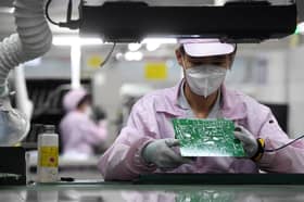 China October industrial output, retail sales beat expectations
