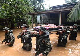 ATM redah banjir bantu usung jenazah warga emas