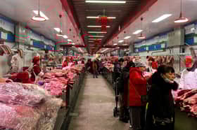 China's consumer prices swing up on seasonal Lunar New Year gains