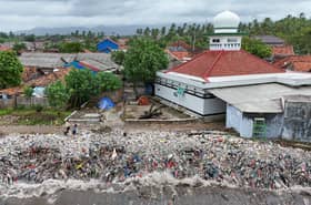 Indonesia fishing village grapples with trash brought in by tides