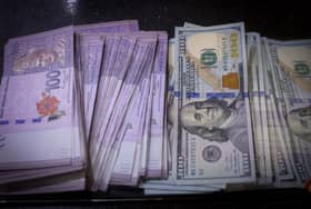 Ringgit slips against US dollar