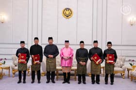 King presents instruments of appointment to four envoys
