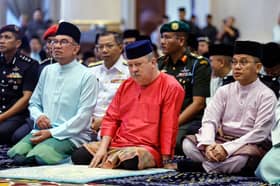 King, Queen perform Aidilfitri prayers at Istana Negara