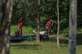 Missing woman's body found, search continues for daughter — Police