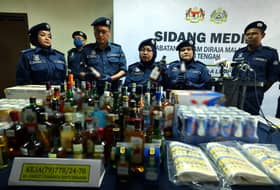Customs Dept seizes steel coils, contraband liquor in two raids