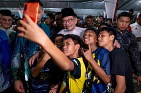 PM Anwar urges putting people first despite differences between Federal, state govts