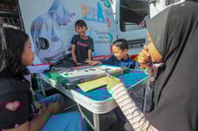 Free health screening tomorrow in Kg Tunku for kids aged 2-12
