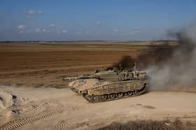 Israel pounds central Gaza, sends tanks into north of Rafah