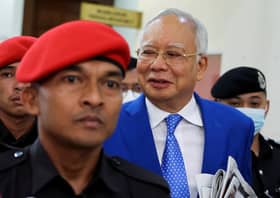 Ex-PM Najib loses legal bid to serve sentence under house arrest