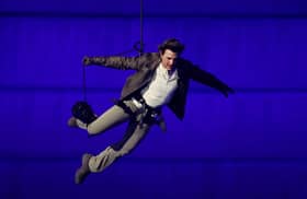 Tom Cruise leaps into action as Paris Games closes and LA takes over Olympic mission