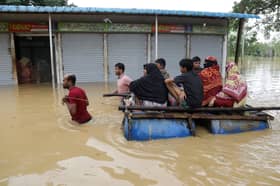 Bangladesh floods maroon nearly three mln people