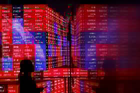 Asia stocks hold steady as more rate cuts loom