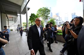Singapore ex-minister pleads guilty to graft