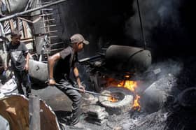 Gazans resort to burning plastic waste for fuel