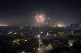 Despite bans, firecrackers sizzle across India for Diwali