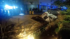 Fallen car retrieved from recurrent Pandan Indah landslide