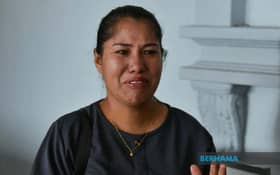 Single mom opposes Perlis govt’s review bid in her kids’ unilateral conversion case