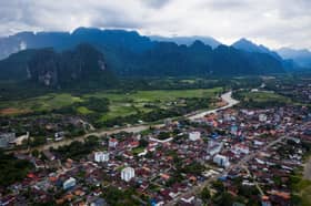 Laos vows justice after tainted alcohol kills tourists