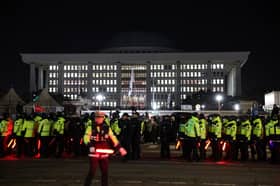 S. Korea’s President declares martial law, then reverses after Parliament backlash