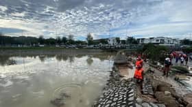 Water retention bund breaks, flooding Taman Seri Alam