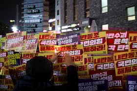 S. Korea cops raid Yoon office over failed martial law as impeachment vote looms