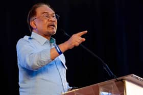 Anwar, Sanusi end defamation case amicably 