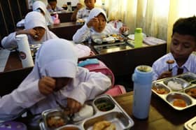 Indonesia dishes out first free meals in programme targeting 83 mln people