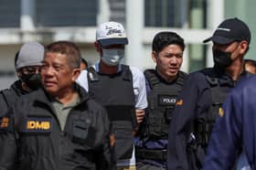 Suspected killer of former Cambodia lawmaker sent to Thailand