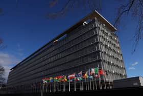 WHO proposes budget cut after US exit, defends its work