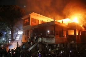 Bangladesh protesters torch ousted PM Hasina's father's home