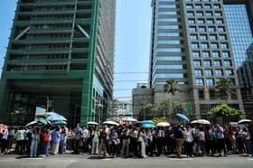 Massive Bangkok quake leaves city reeling, building crumbles