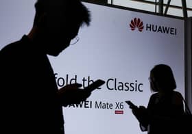 After years of survival, China’s Huawei returns to revenue peak