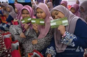 Yide rai anak yatim, agih bantuan raya RM1.93 juta