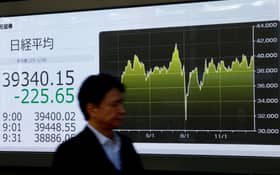 Asia shares in tense wait for tariff news, bitcoin surge