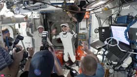NASA astronauts head home on SpaceX capsule after drawn-out station stay
