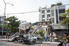 Woman pulled alive from Myanmar earthquake rubble; race to find more survivors