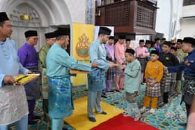 Tengku Amir presents Yide's Aidilfitri contributions to orphans
