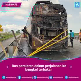 Bas persiaran dalam perjalanan ke bengkel terbakar