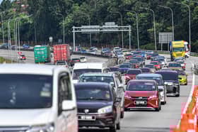 20 km traffic jam on KLK Highway as Raya travellers return — LLM