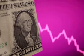 Dollar wallows near 3-year low as Trump's attacks on Fed chief unnerve traders